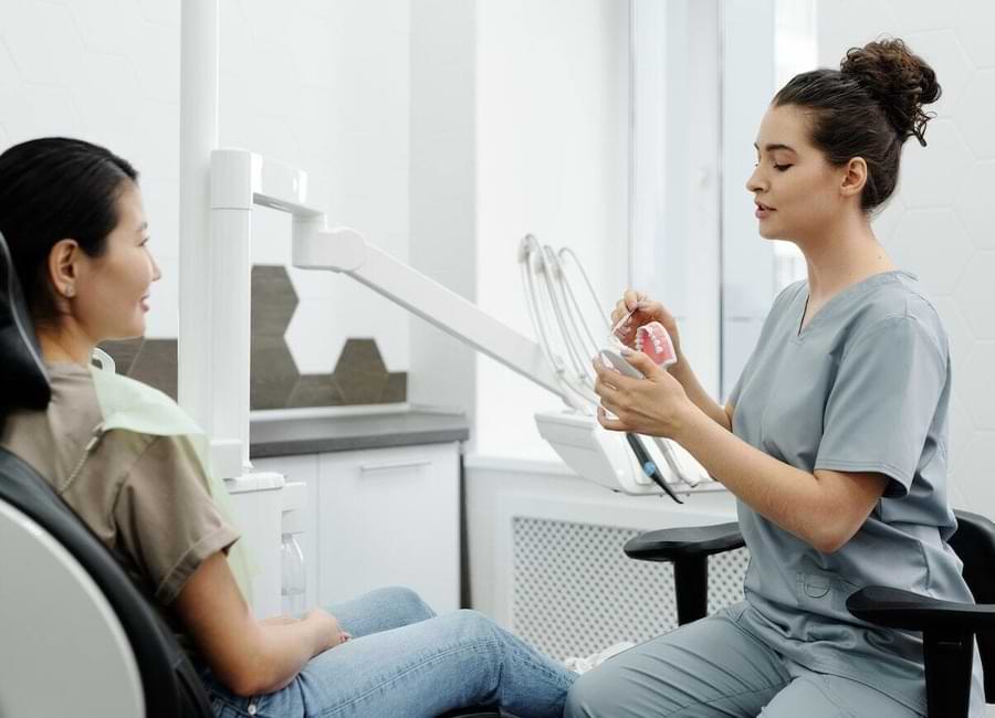 Dentist Examination To Patient